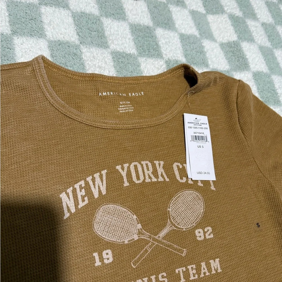 American Eagle New York City Tennis Graphic Baby Tee
Size Small - Picture 4 of 4
